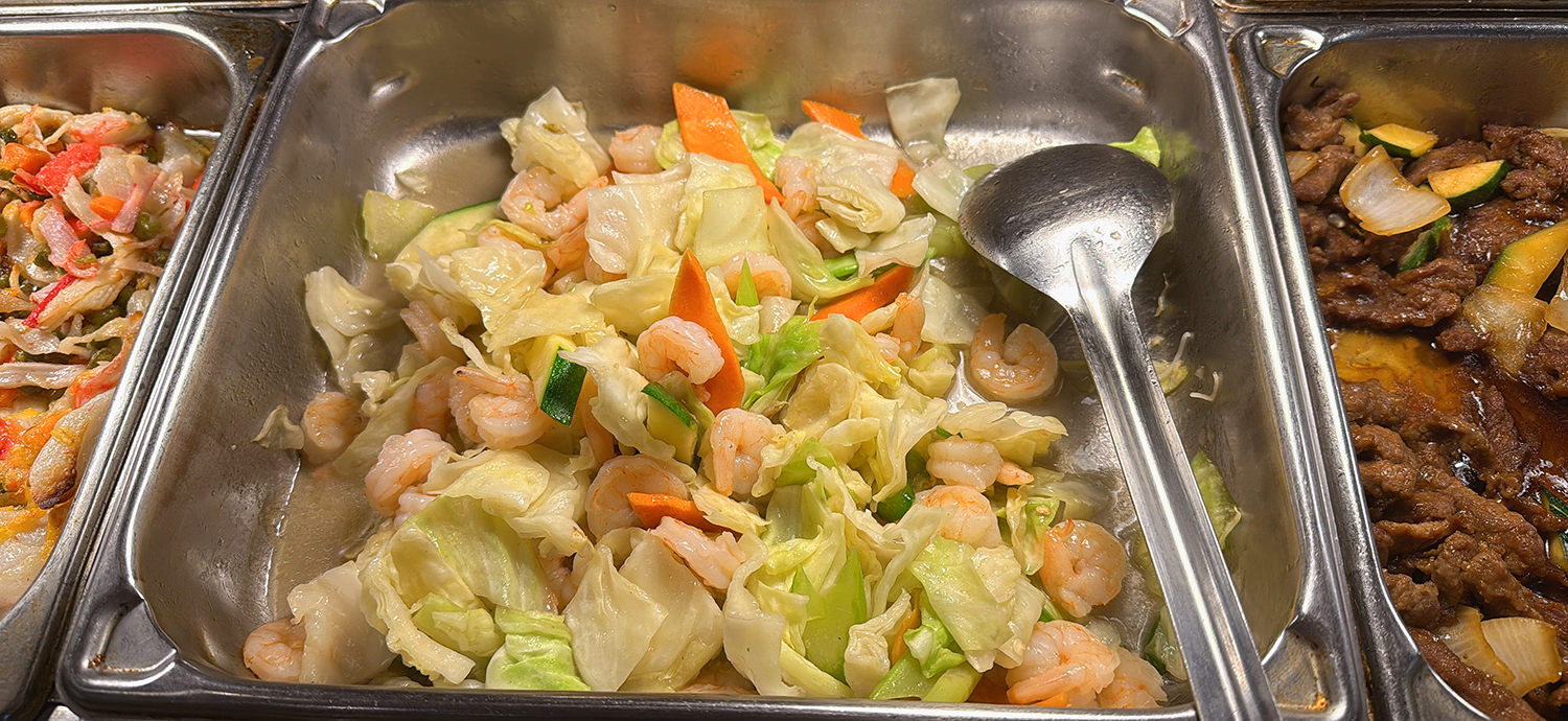 Shrimp stir - fried with cabbage in a serving pan at Golden Wok，a Chinese Restaurant in Weaverville