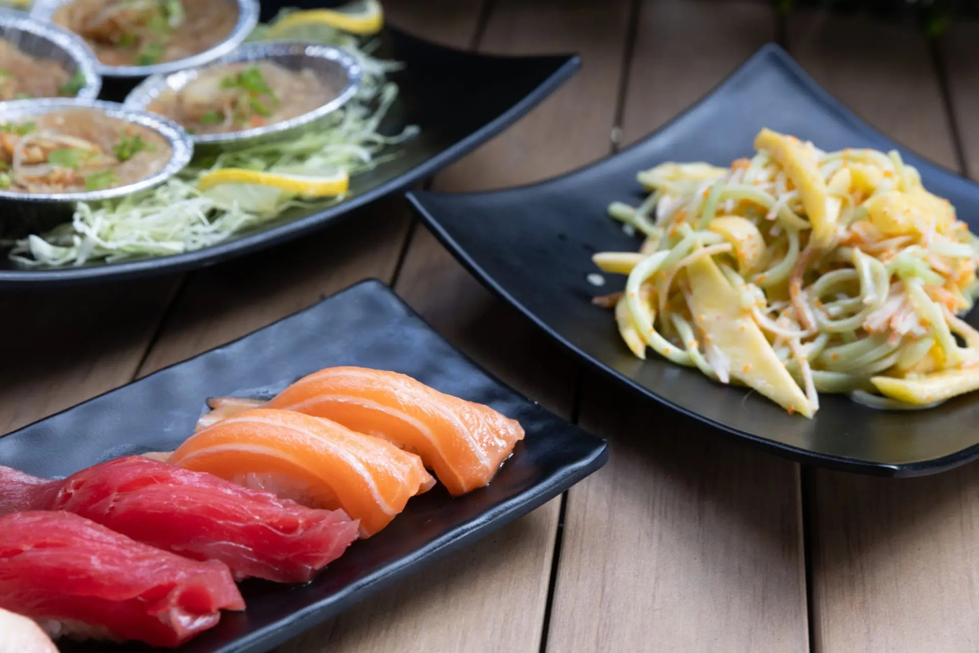Platters with sushi, noodles and side dishes at Niku Sushi, a Japanese restaurant in Anaheim