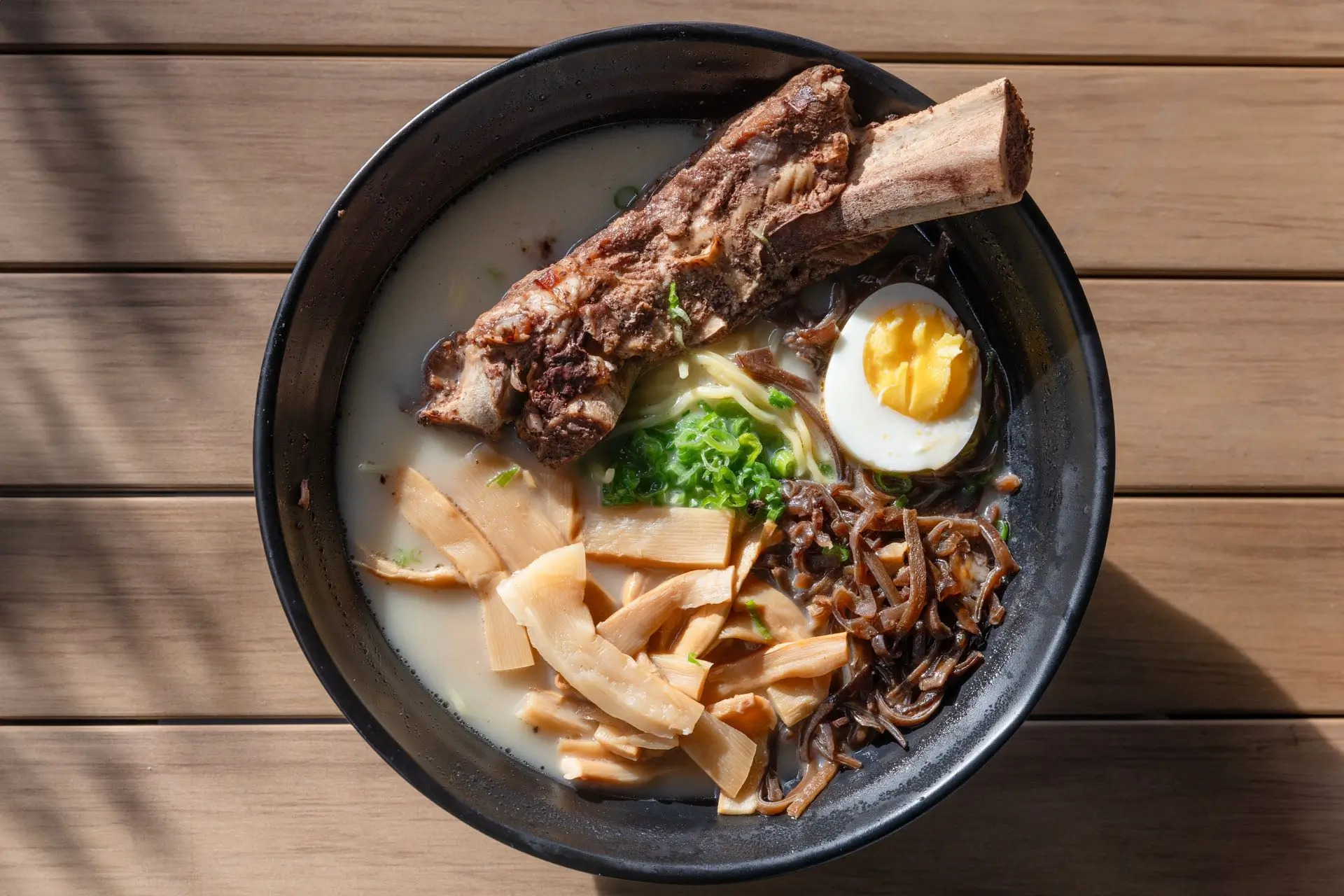 Ramen with pork bone broth, egg, bamboo shoots and scallions at Niku Sushi, a Japanese restaurant in Anaheim