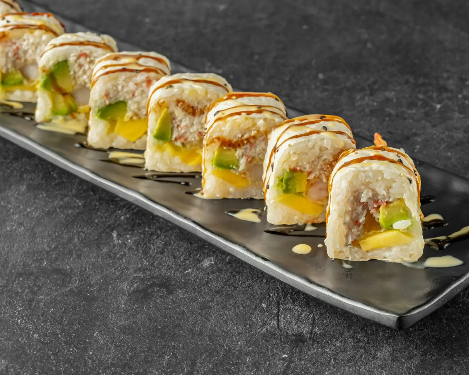 Sushi roll with mango, avocado and crab at Niku Sushi, a Japanese restaurant in Anaheim