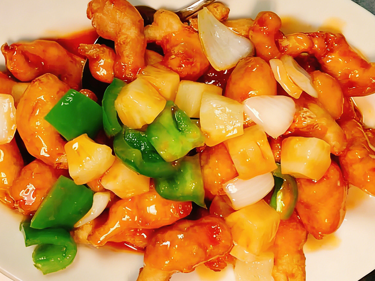 Crispy fried chicken tossed in a tangy sweet and sour sauce at Gourmet House，a Chinese Restaurant in Algonquin