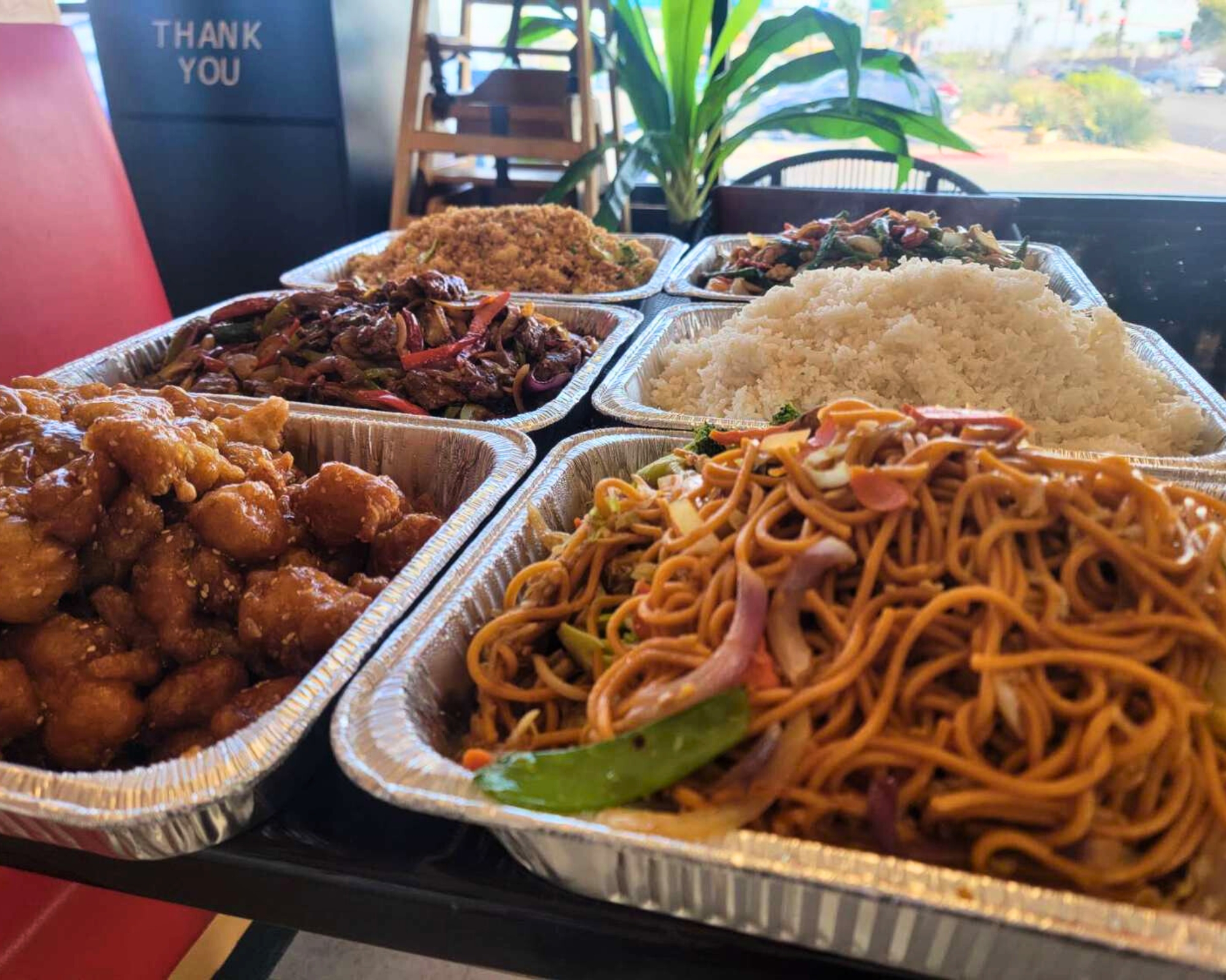 Gourmet-Wok-Chinese Food-Chinese-Restaurant-Assorted-Chinese-Dishes-Las-Vegas Assorted Chinese dishes in trays at Gourmet Wok Chinese Food, a Chinese restaurant in Las Vegas.