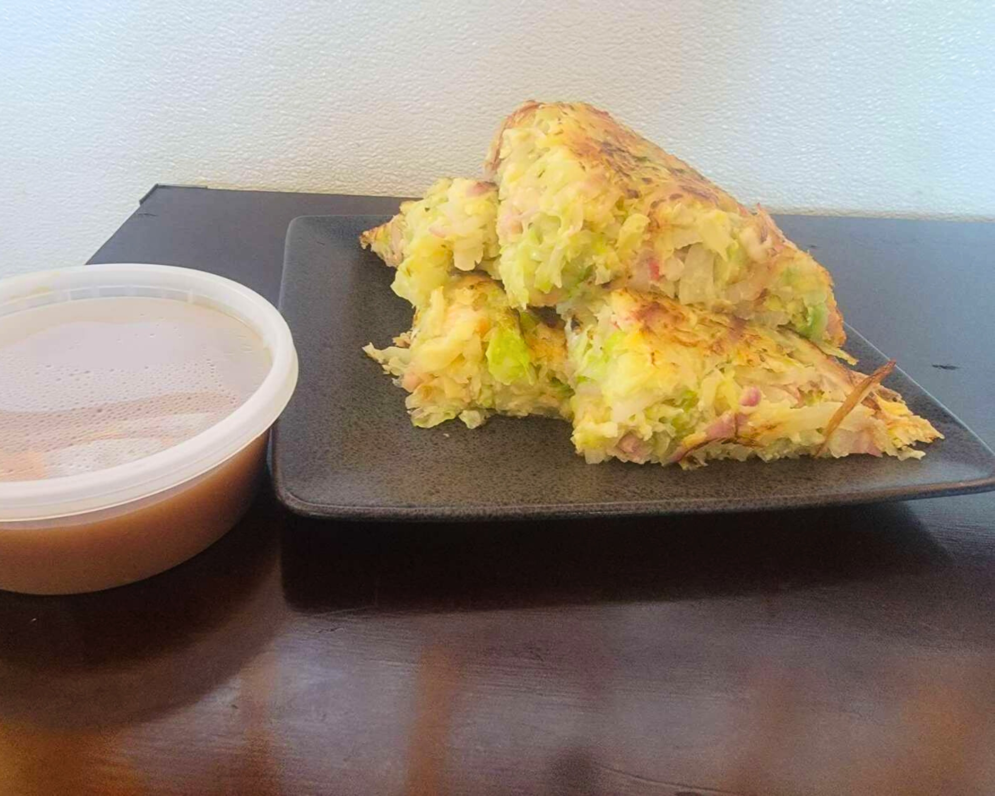 Gourmet-Wok-Chinese-Food-Chinese-Restaurant-Okonomiyaki-Las-Vegas Okonomiyaki with sauce at Gourmet Wok Chinese Food, a Chinese restaurant in Las Vegas.