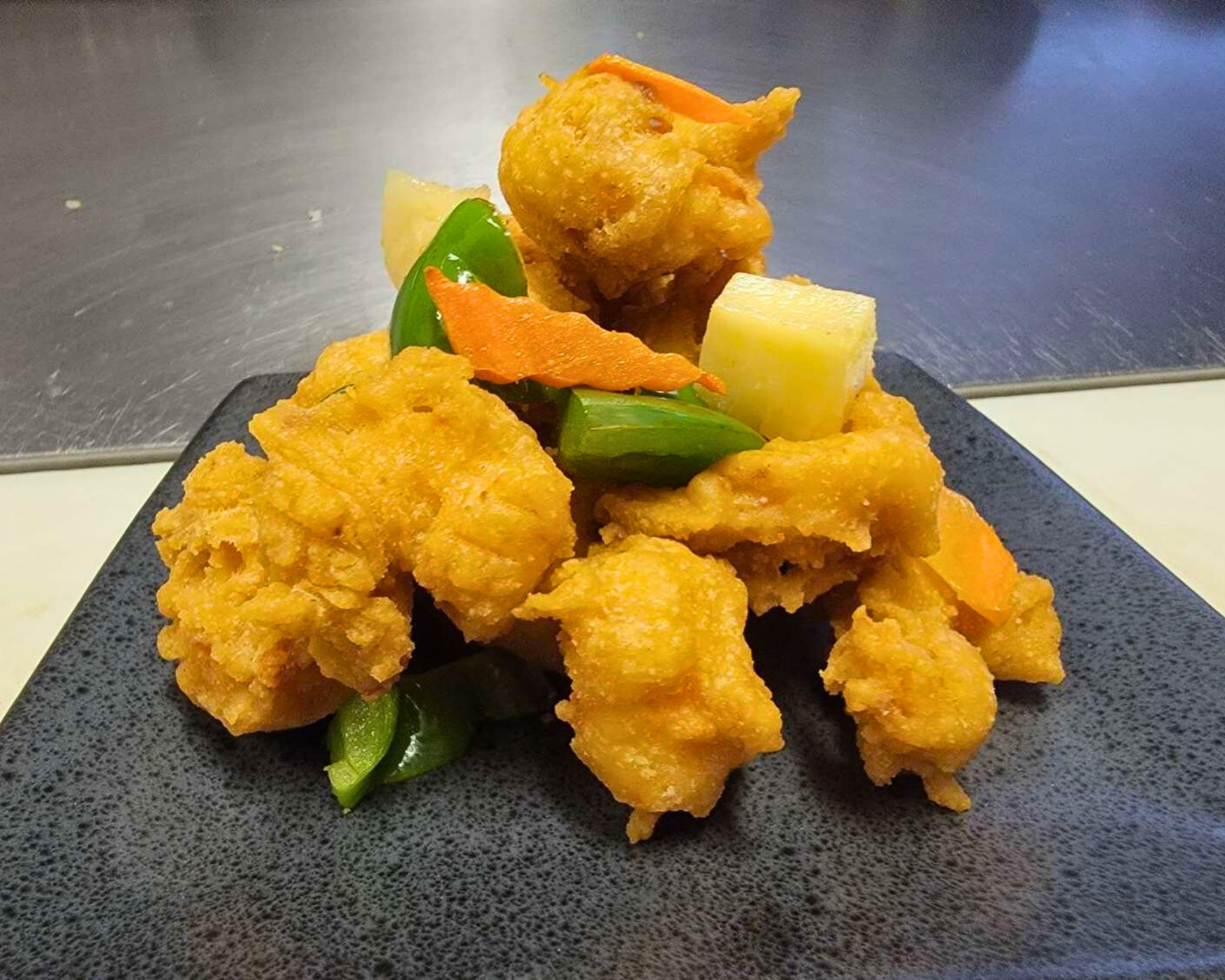 Gourmet-Wok-Chinese-Food-Chinese-Restaurant-Sweet-And-Sour-Pork-Las-Vegas Crispy sweet and sour pork with veggies at Gourmet Wok Chinese Food, a Chinese restaurant in Las Vegas.
