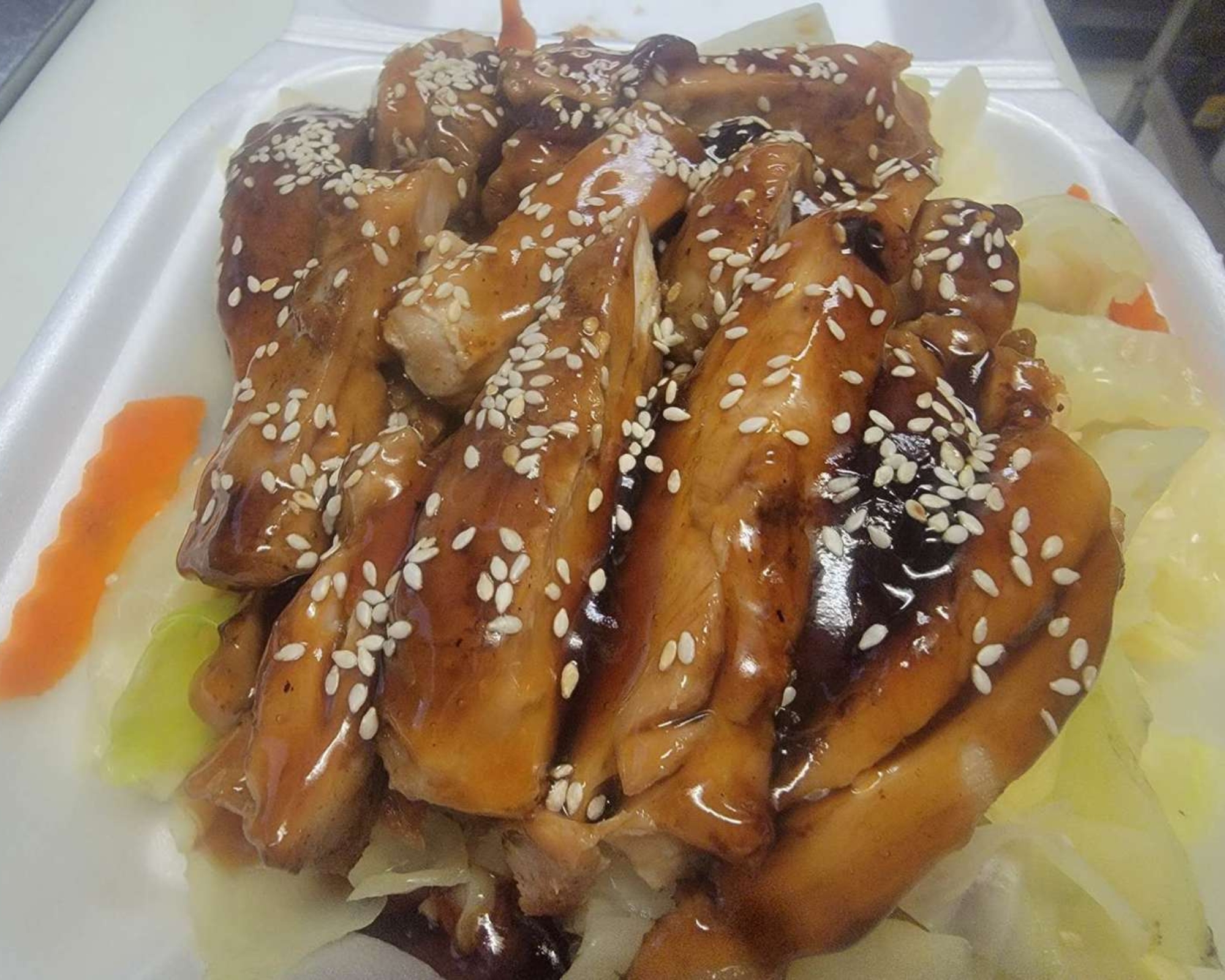 Gourmet-Wok-Chinese-Food-Chinese-Restaurant-Teriyaki-Chicken-Las-Vegas Teriyaki chicken with sesame seeds at Gourmet Wok Chinese Food, a Chinese restaurant in Las Vegas.