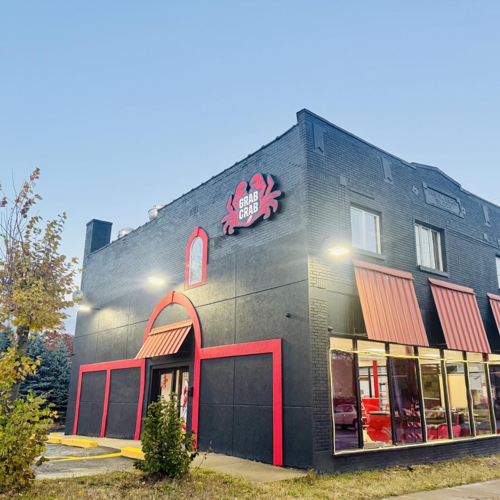 Corner view of the restaurant building in daylight at Grab Crab, a Seafood Restaurant in Pontiac