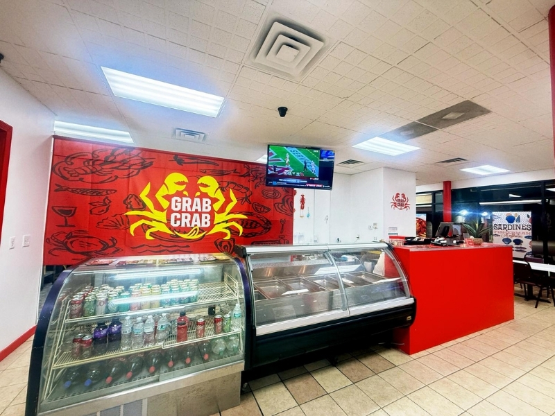 Interior counter area with fridge at Grab Crab, a Seafood Restaurant in Pontiac