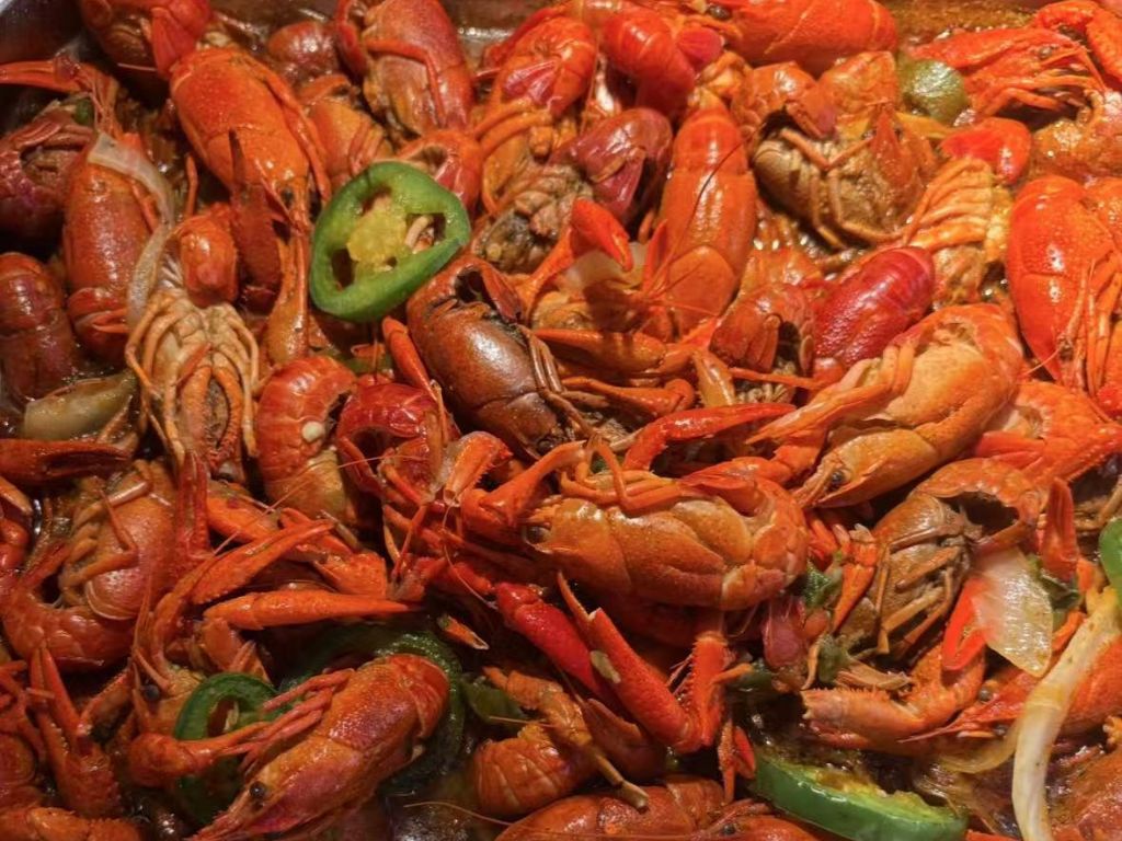Grand-Buffet-Buffet-restaurant-Spicy-Crayfish-NY Spicy Crayfish features cooked crayfish coated in a spicy sauce at Grand Buffet, a Buffet restaurant in NY