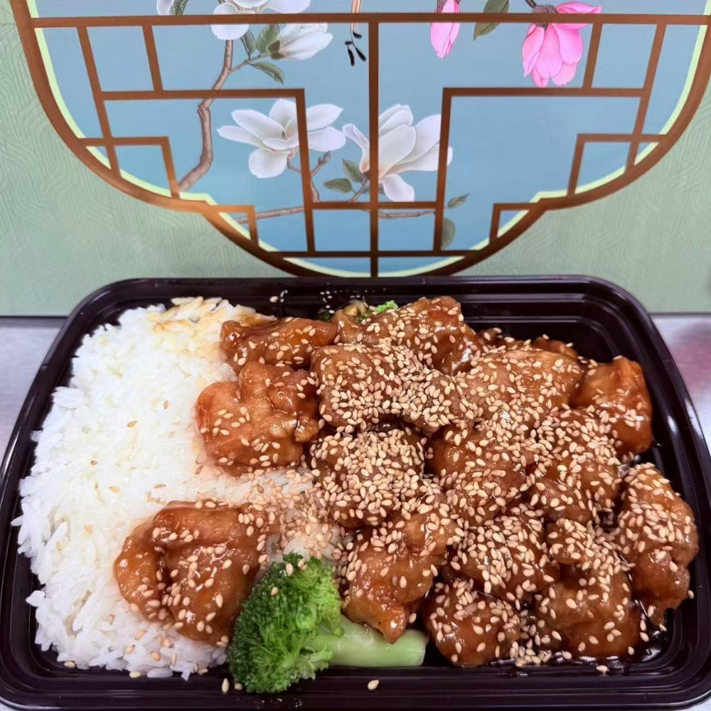Glazed sesame chicken over steamed rice with broccoli at Great China, an Chinese Restaurant in Naugatuck