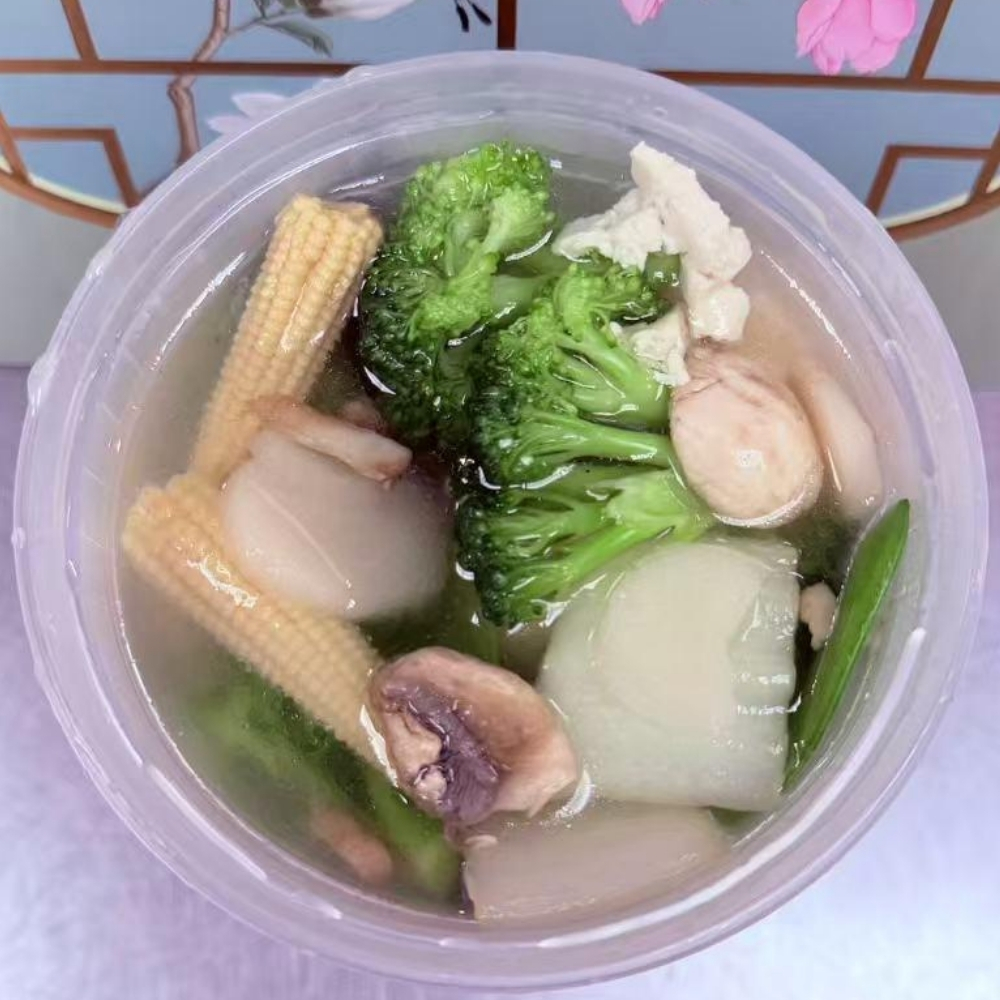 Light mixed vegetable and tofu soup in a plastic container at Great China, an Chinese Restaurant in Naugatuck