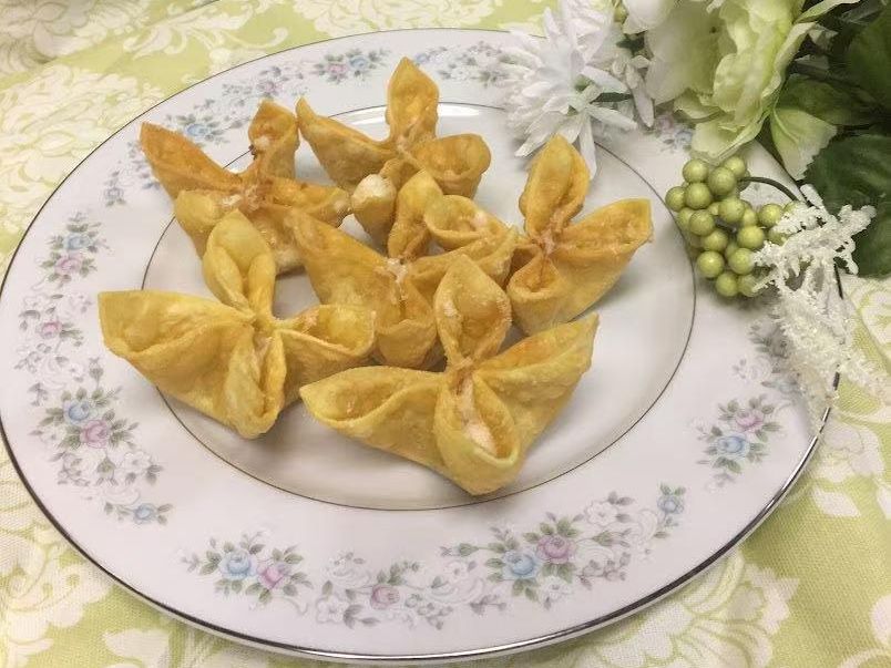 Fried cheese wontons arranged on a plate at Green Heaven - Chinese Restaurant in Holmes