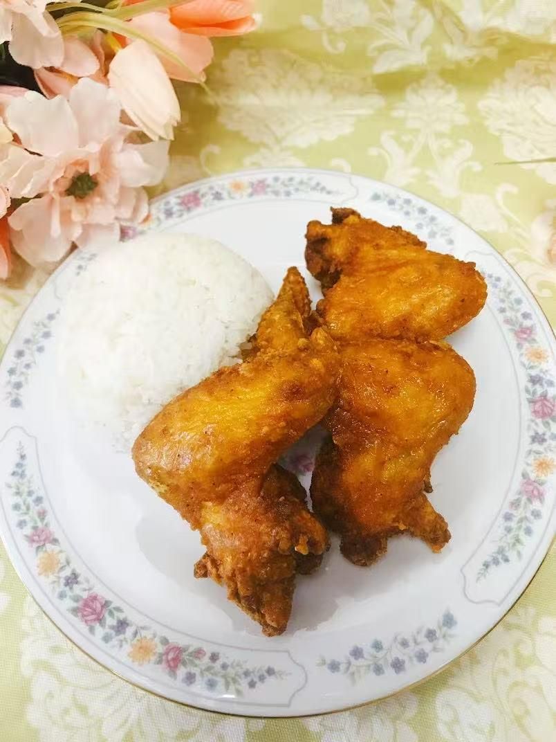Fried chicken wings with steamed white rice at Green Heaven - Chinese Restaurant in Holmes