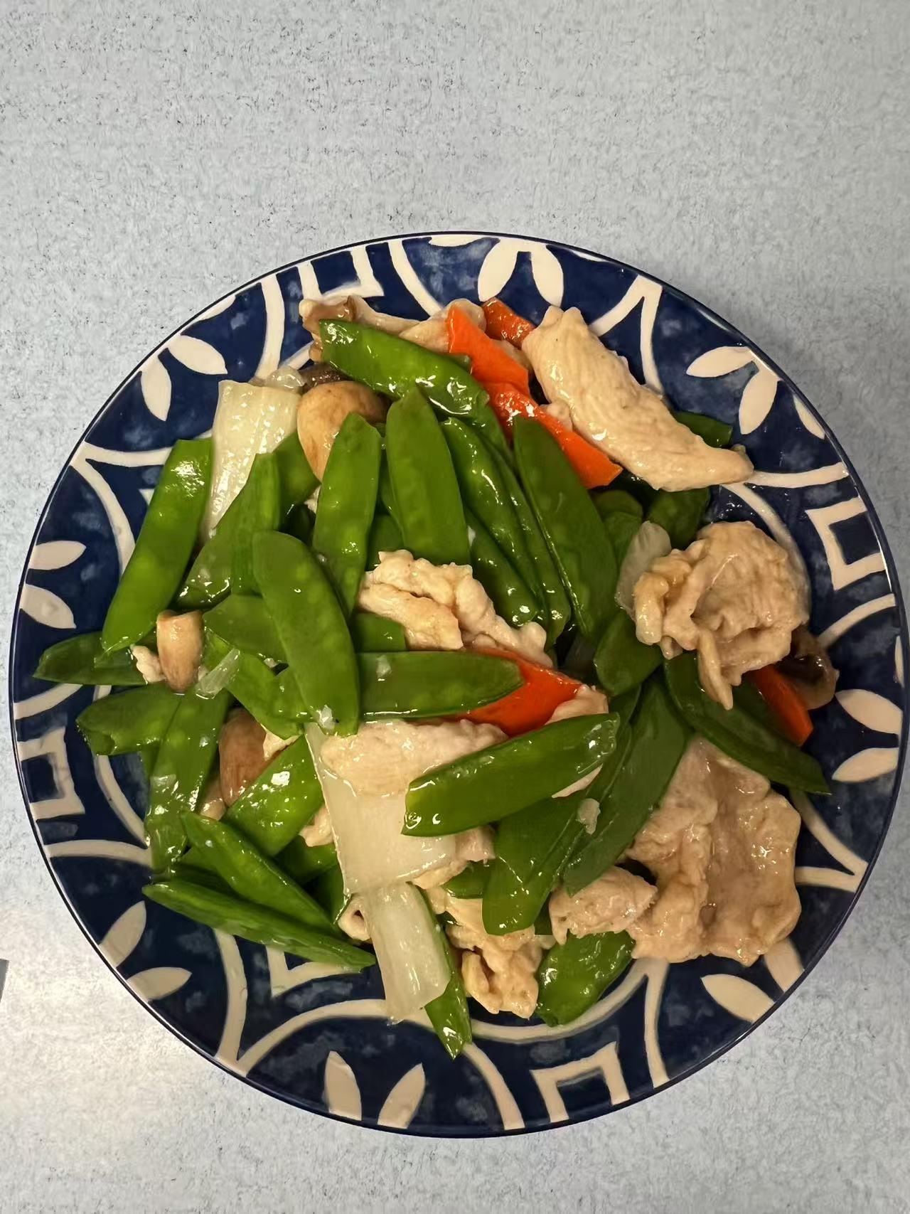 Chicken with snow peas at Green Jade,a Chinese Restaurant in Depew.