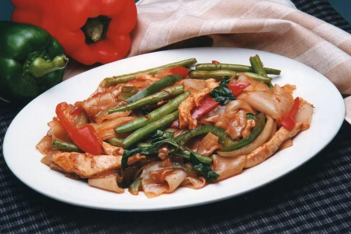 Wide noodles with chicken and beans at Green Peapod Restaurant, a Chinese Restaurant in Watertown
