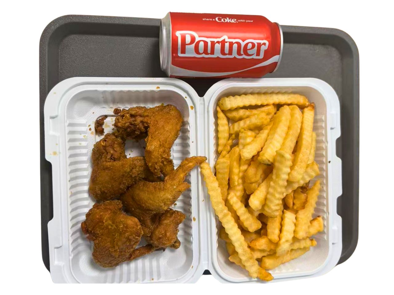 Green-Tea-Chinese-Restaurant-Fried-Chicken-and-French-Fries-Meal-Staten-Island Fried chicken pieces served with French fries and a can of soda at Green Tea, a Chinese Restaurant in Staten Island