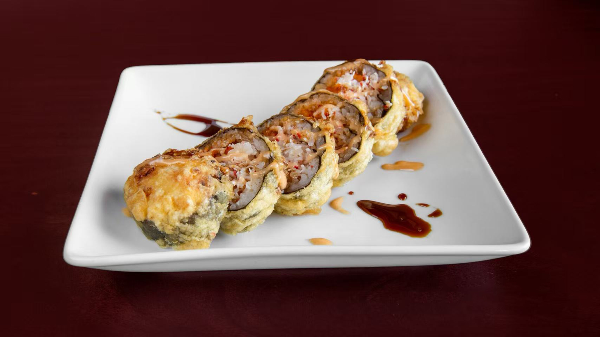 Stuffed Eggplant Roll with Cheese and Sauce at Green Tea Sushi Bar，a Japanese Restaurant in Covington