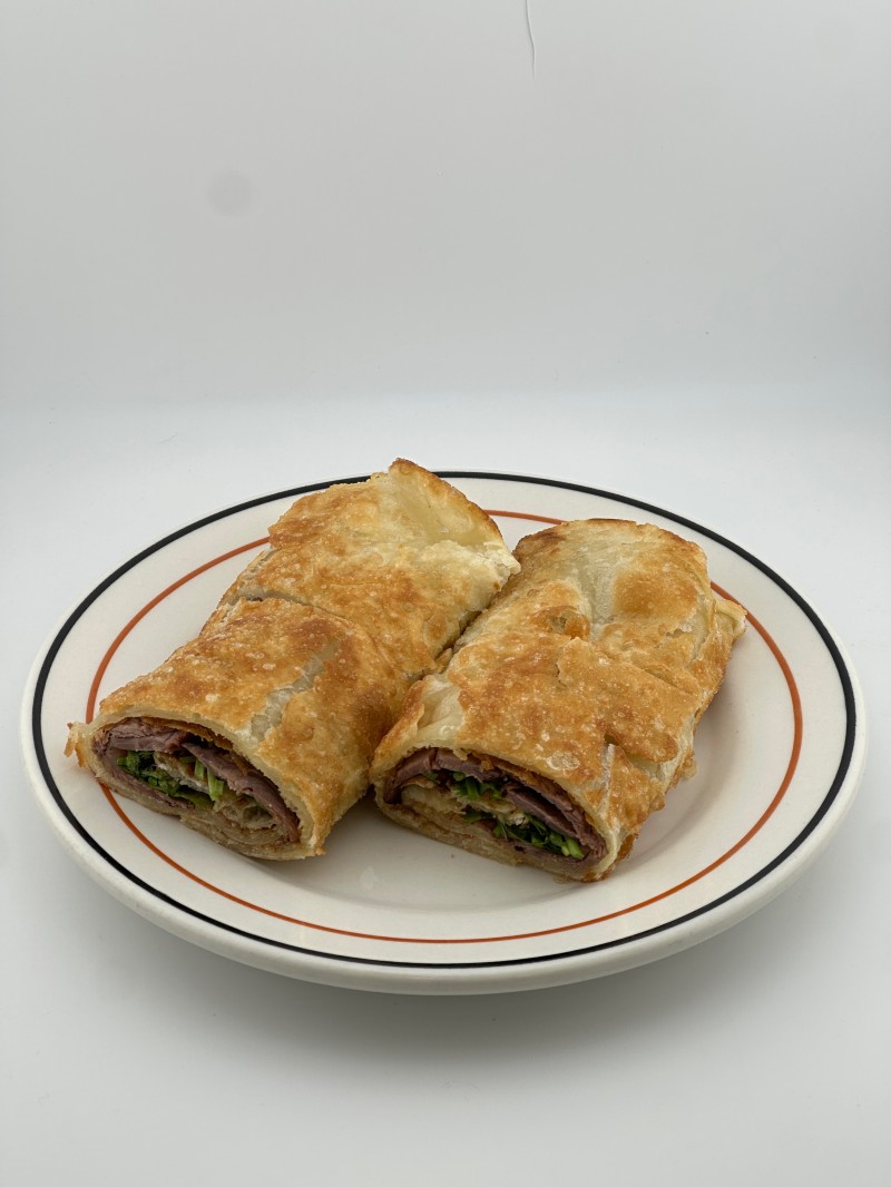 Crispy burrito filled with beef and veggies at Mei Mei Cafe, a Chinese Restaurant in Seattle
