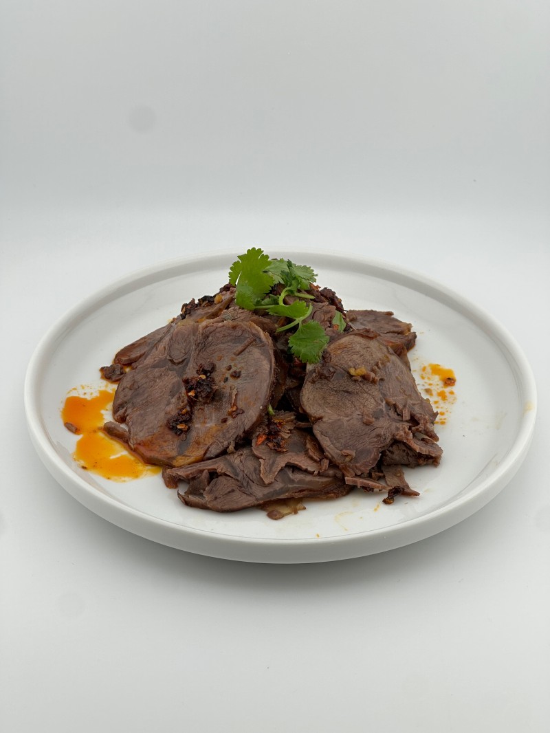 Tender beef shank slices with flavorful sauce at Mei Mei Cafe, a Chinese Restaurant in Seattle