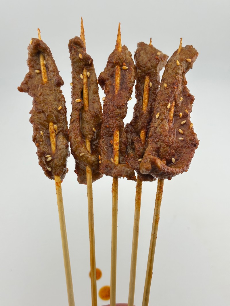 Five seasoned beef skewers, savory at Mei Mei Cafe, a Chinese Restaurant in Seattle
