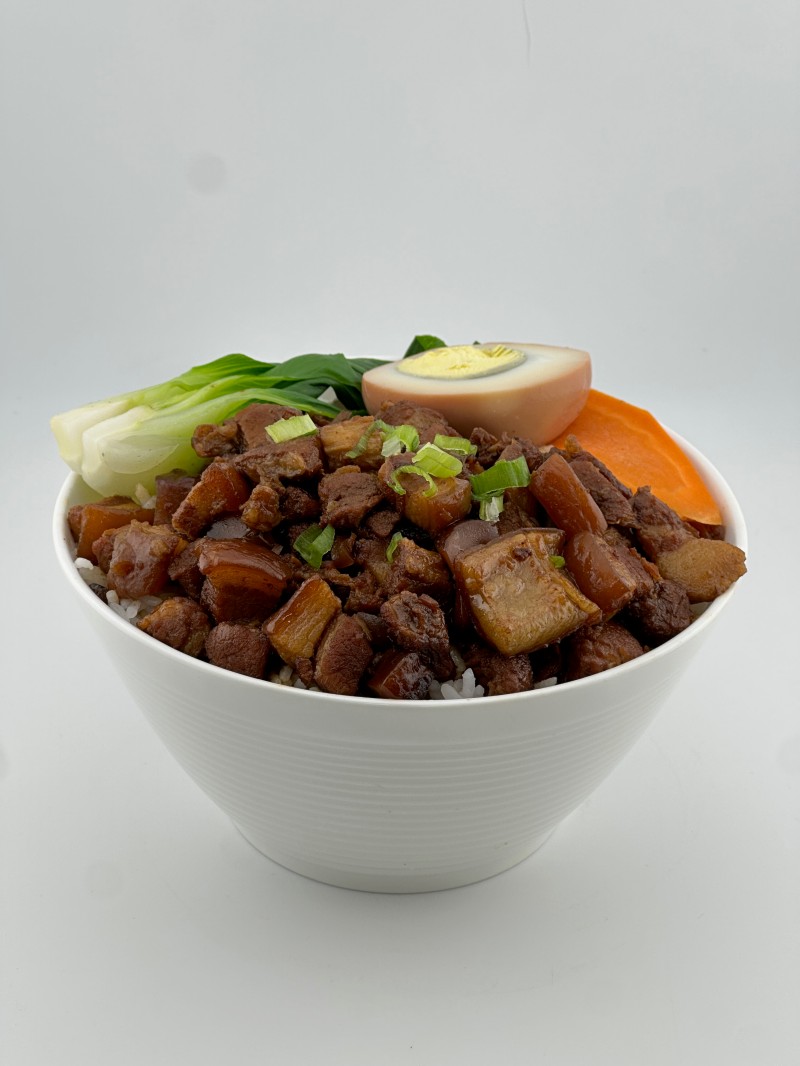 Rice with tender braised pork and veggies at Mei Mei Cafe, a Chinese Restaurant in Seattle