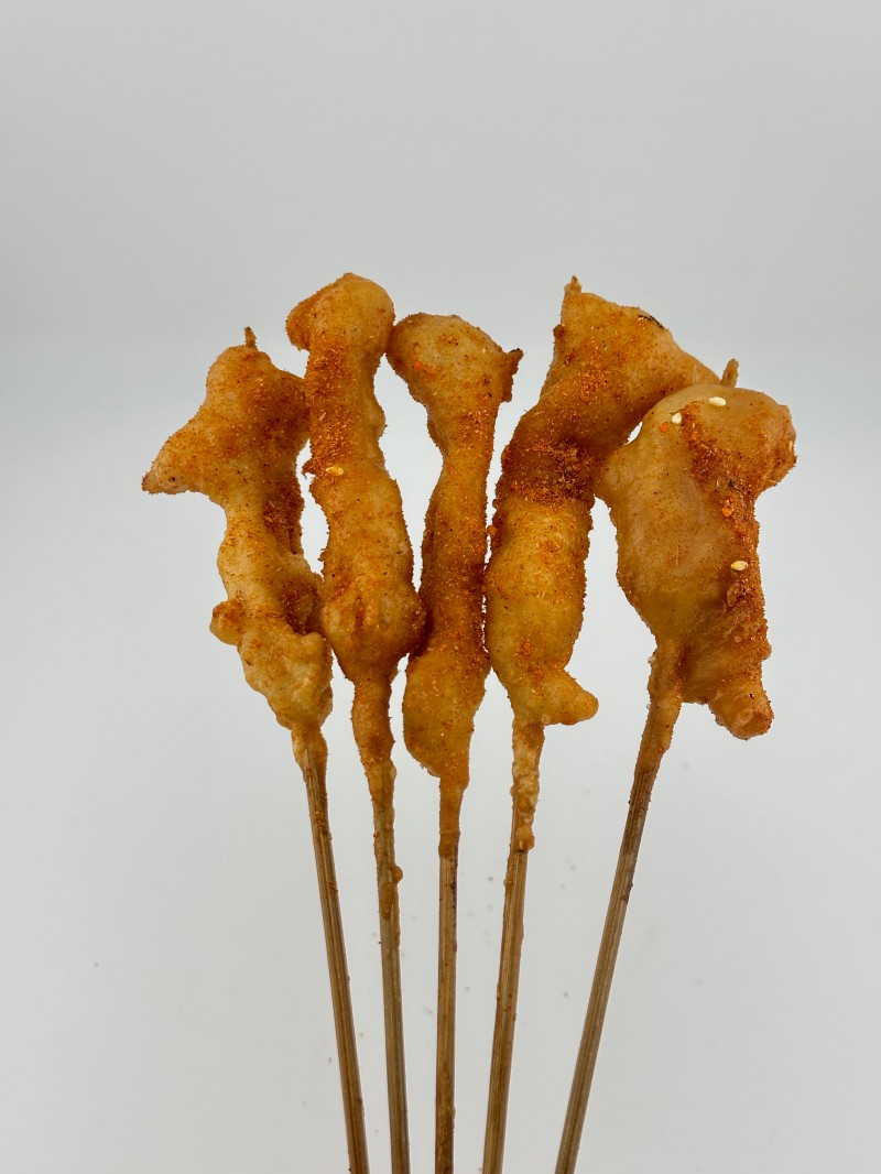 Five crispy chicken skewers, well-seasoned at Mei Mei Cafe, a Chinese Restaurant in Seattle