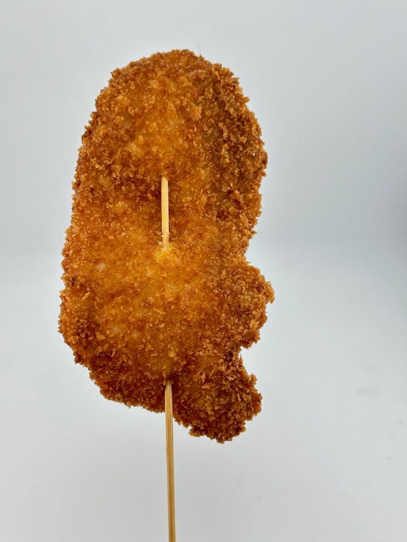 Large, crispy hand - size chicken chop at Mei Mei Cafe, a Chinese Restaurant in Seattle