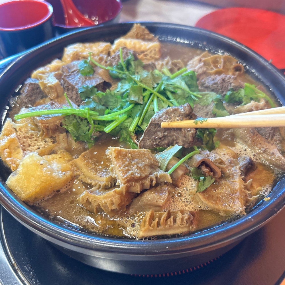 A hot pot with beef tripe and other ingredients at GWONGFU BEEF MIX INC, a Chinese Restaurant in Brooklyn
