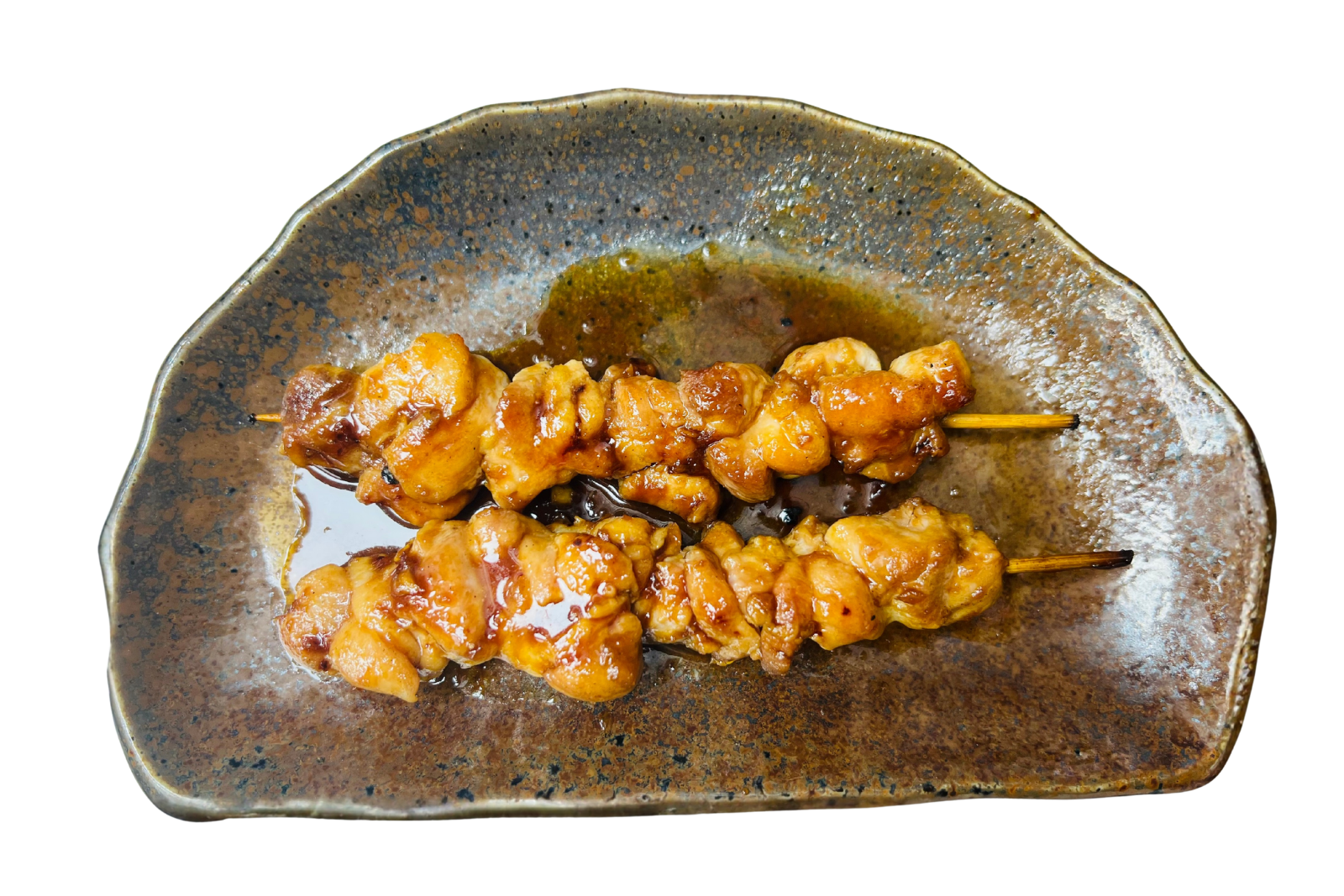 Glazed chicken skewers with savory sauce at Hachikawa Sushi, a Japanese Restaurant in Flushing