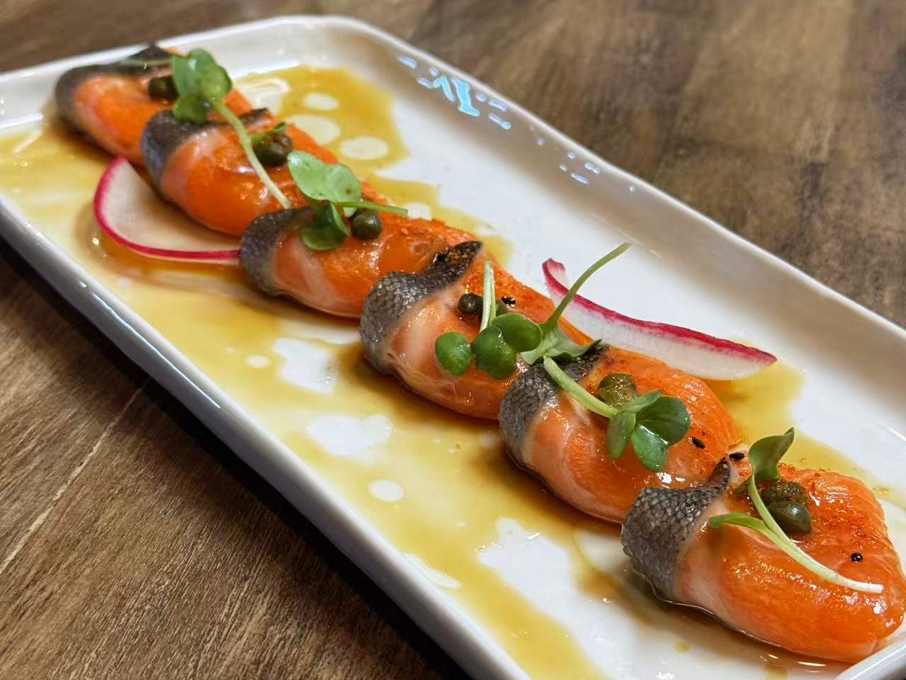 Iwana tataki with radish at Hakkai Nigiri Bar & Tapas, a Japanese Restaurant in San Carlo