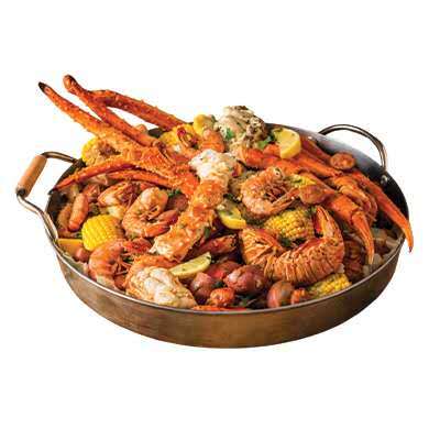 Seafood boil with king crab legs, shrimp, corn, potatoes, and lemon at Cherry Amber, a Asian fusion restaurant in Plainview