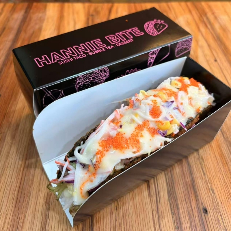 Crab stick sushi taco loaded with creamy sauce at Hannie Bite, Asian Restaurant in Philadelphia