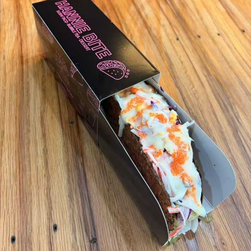Crab stick sushi taco topped with roe at Hannie Bite, Asian Restaurant in Philadelphia