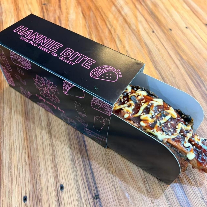 Eel sushi taco glazed with thick sweet savory sauce at Hannie Bite, Asian Restaurant in Philadelphia