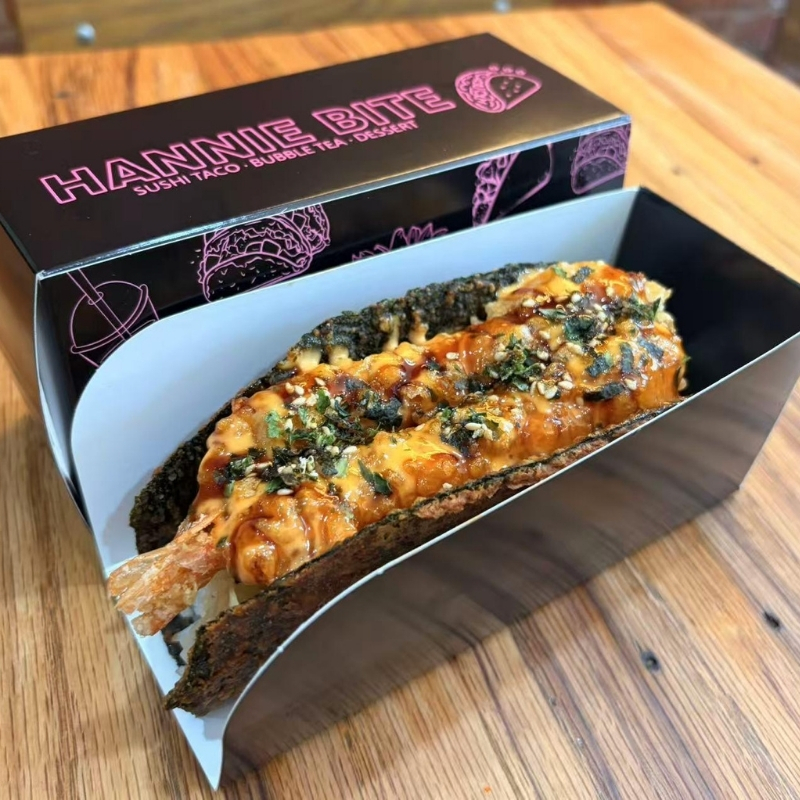 Fried shrimp sushi taco topped with sesame and seaweed at Hannie Bite, Asian Restaurant in Philadelphia