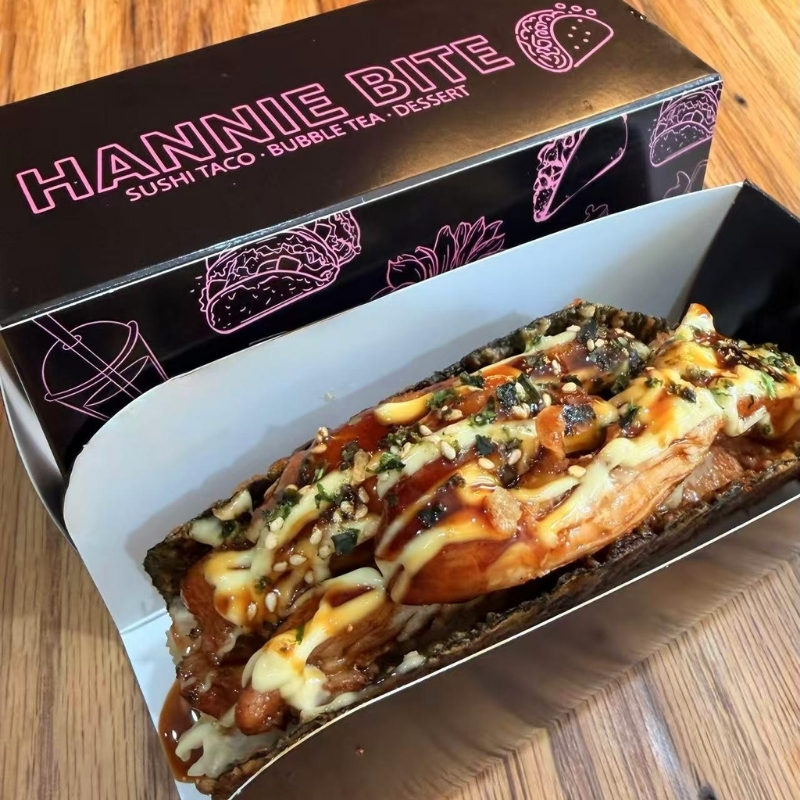 Teriyaki chicken sushi taco with mixed sauces at Hannie Bite, Asian Restaurant in Philadelphia