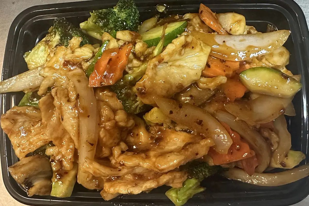 Spicy sliced chicken stir-fried with broccoli, zucchini and carrots at Happy China, a Chinese Restaurant in Martinez