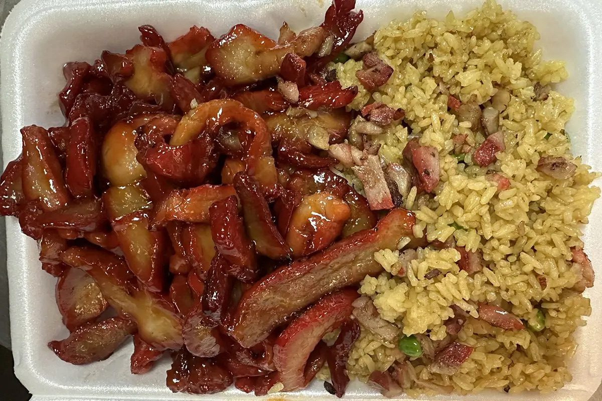 Glazed BBQ pork served with yellow fried rice at Happy China, a Chinese Restaurant in Martinez