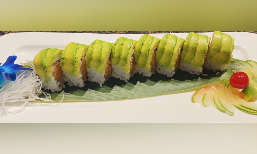 Sushi roll topped with avocado slices at Haru Sushi, a Japanese restaurant in Williamsburg