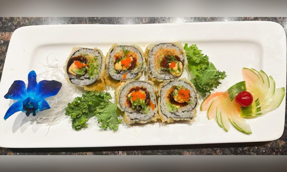 Deep - fried sushi rolls with fresh toppings at Haru Sushi, a Japanese restaurant in Williamsburg