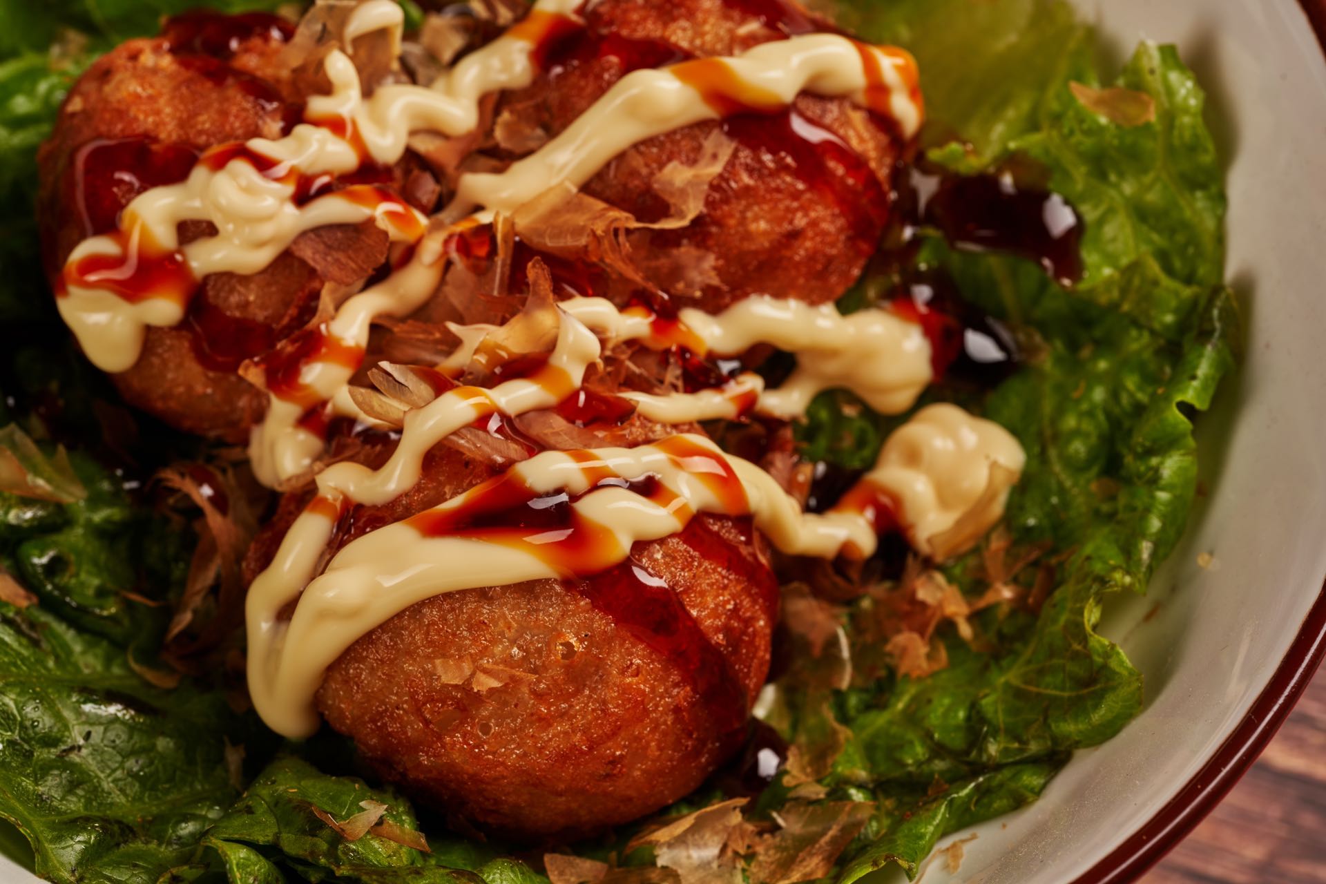Bowl - served takoyaki, with lettuce, drizzled with salad dressing and teriyaki sauce, sprinkled with bonito flakes at Haya Sushi Enfield，a Japanese Restaurant in Enfield