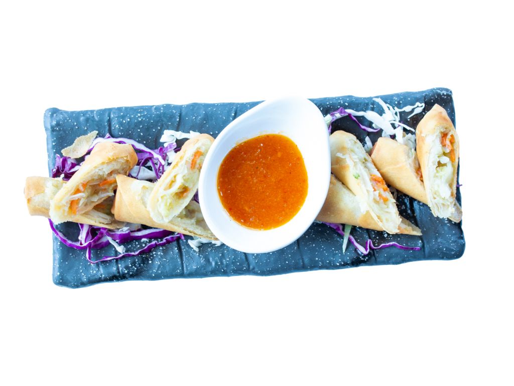 Crispy vegetable rolls served with sweet chili sauce at Billings Heights Hokkaido Ramen House, a Japanese restaurant in Billings