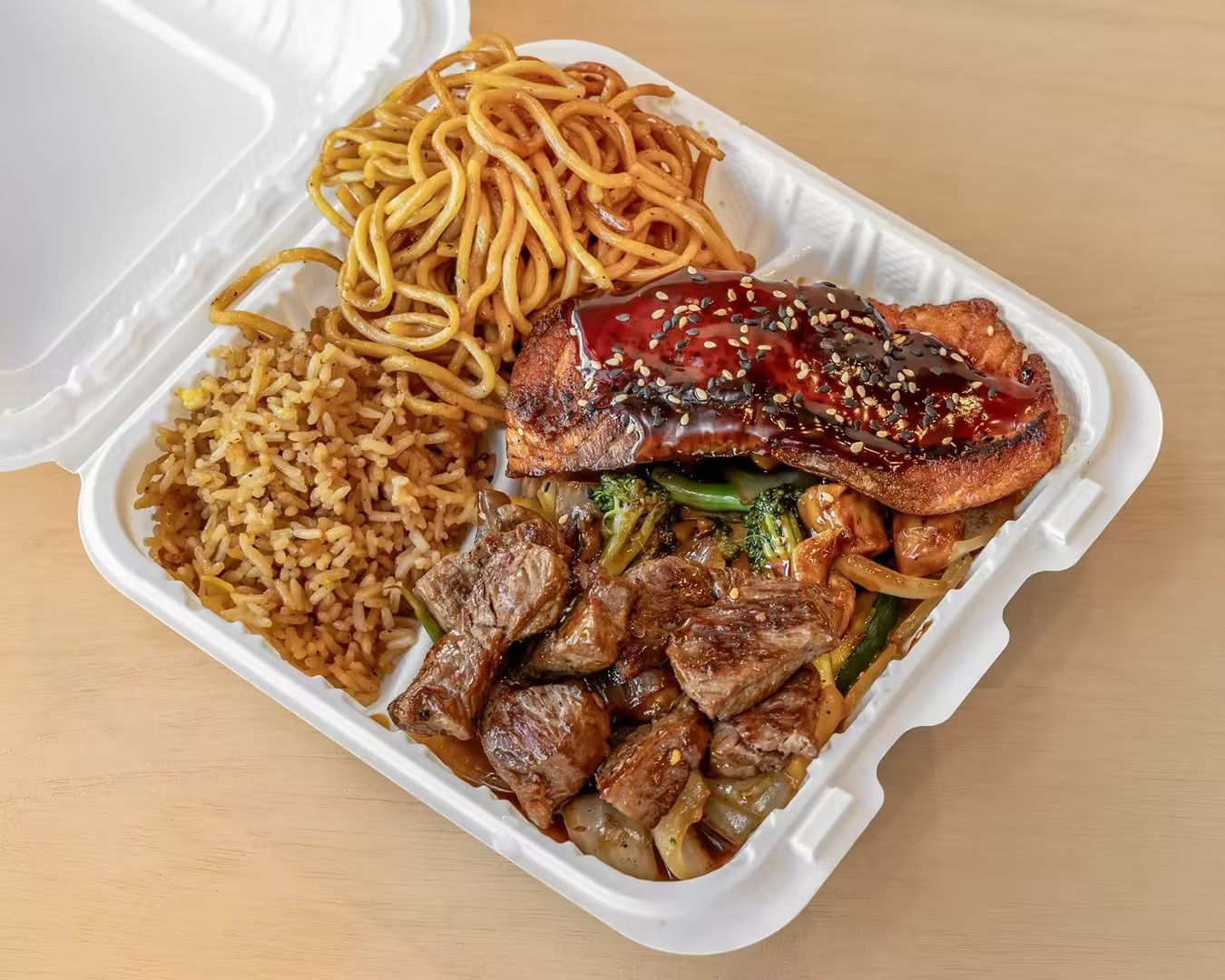 Steak and salmon hibachi combo with fried rice and lo mein at Hibachi Station, a Japanese Restaurant in Troy