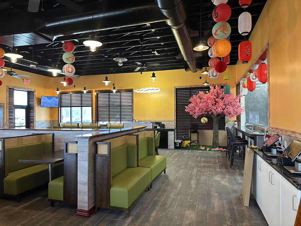 Cozy interior of Hikari Sushi, a Japanese Restaurant in Jacksonville with lanterns and booth seating