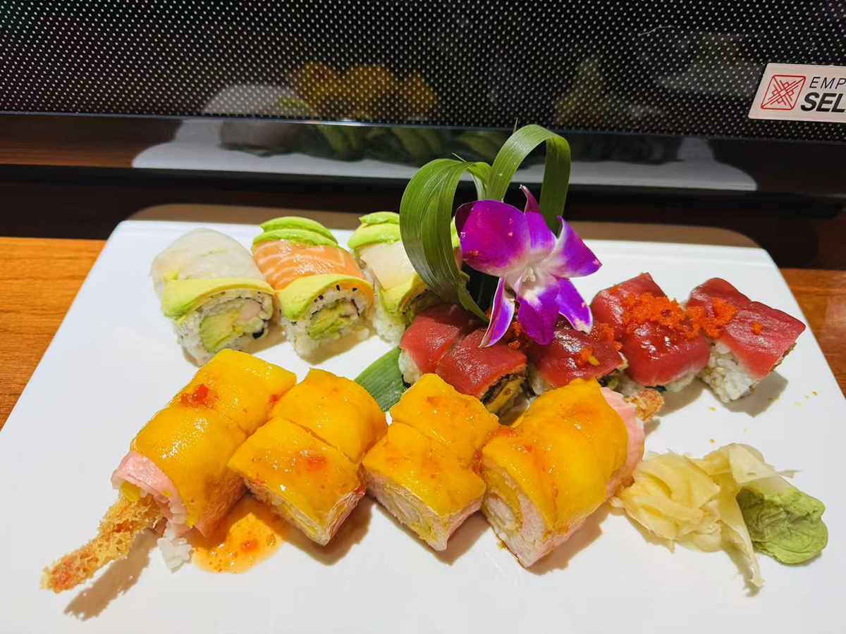 Colorful sushi platter with mango, tuna and avocado rolls at Hikari Sushi, a Japanese Restaurant in Jacksonville