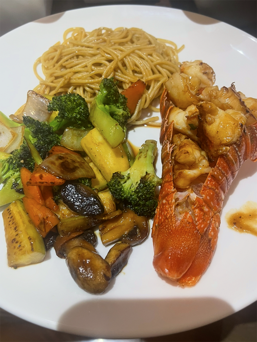 Grilled lobster tail with stir-fried noodles and mixed vegetables at Hikari Sushi, a Japanese Restaurant in Jacksonville