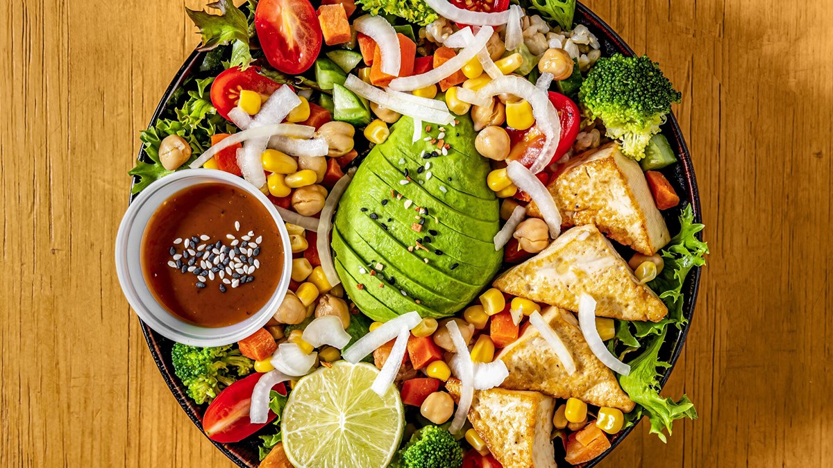 Avocado tofu salad bowl with mixed veggies and dressing at Hi Sunny Restaurant Salad & Dimsum, a Chinese Restaurant in New York