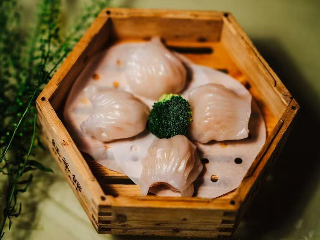 Transparent Har Gow shrimp dumpling in bamboo steamer at HK Bistro, a Chines Hong Kong Restaurant in Portland