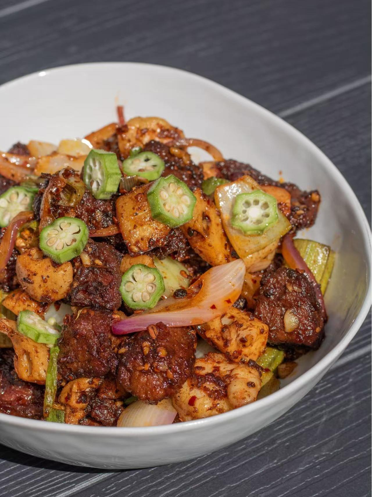 Spicy seafood and steak bowl with okra and veggies at HK Bistro, a Chines Hong Kong Restaurant in Portland