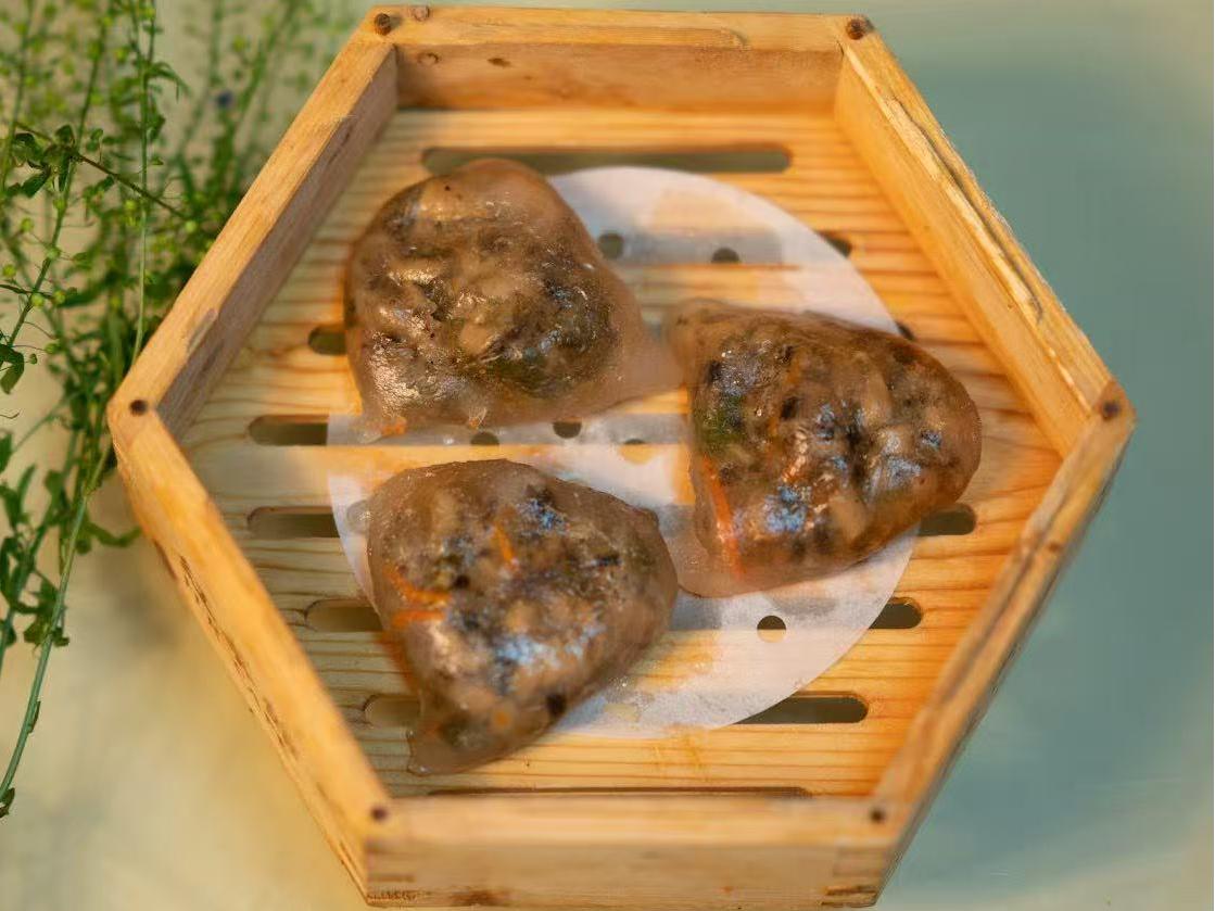 Transparent vegetarian dumpling with mixed filling in bamboo steamer at HK Bistro, a Chines Hong Kong Restaurant in Portland