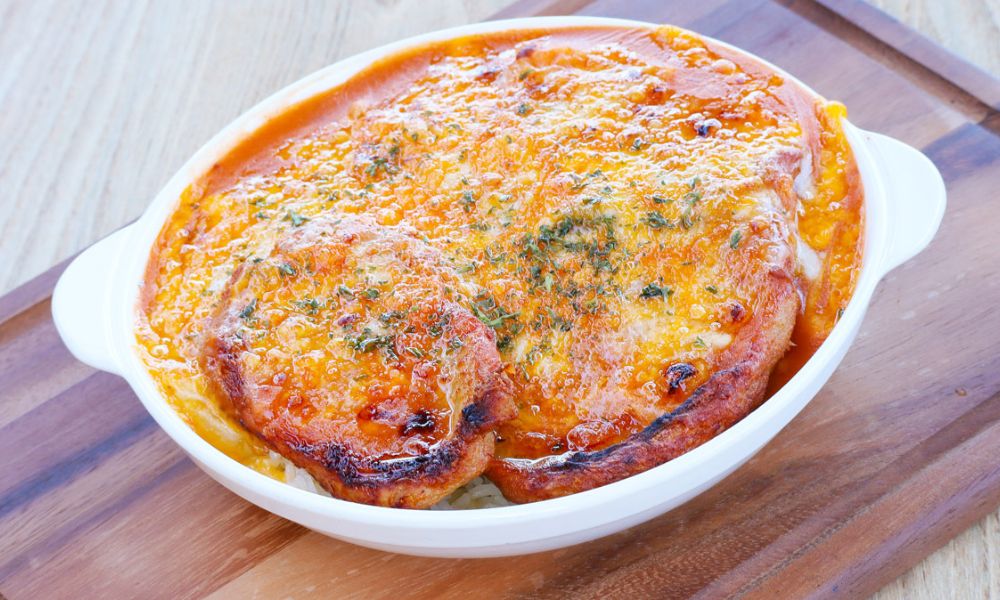 Baked pork chop with rice at Hong Kong City Restaurant, a Chinese Restaurant in Alameda